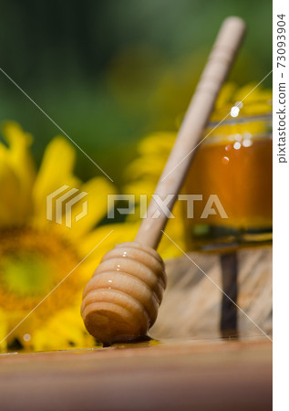 Different kinds of honey on wooden background. Healthy organic honey Different kinds of honey on wooden background. Healthy organic honey 73093904