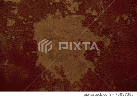 Flaking red paint texture on an old wall Flaking red paint texture on an old wall 73097395