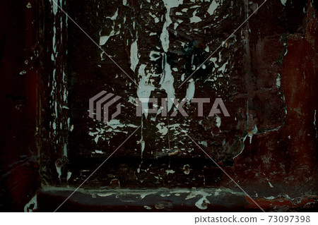 Grungy old peeling damaged paint on wood 73097398