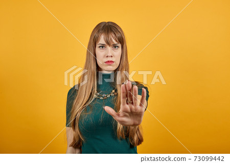 Palm arm raised air angry look straight you will not pass through facial harsh. Palm arm raised air angry look straight you will not pass through facial harsh. 73099442