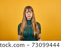 Upset offended looking big eyes, blowing cheeks being annoyed after quarrel 73099444
