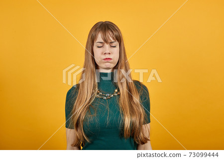 Upset offended looking big eyes, blowing cheeks being annoyed after quarrel Upset offended looking big eyes, blowing cheeks being annoyed after quarrel 73099444