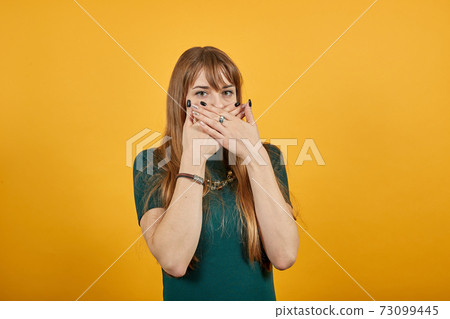 Covering mouth with palm. Can't say anything. Shocked gasping amazed stunning Covering mouth with palm. Can't say anything. Shocked gasping amazed stunning 73099445