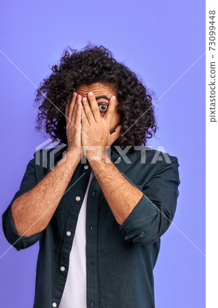 arabic male is terrified by something 73099448