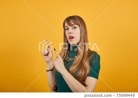 Hand points index finger up, pointing forefinger surprise gift option, idea. Hand points index finger up, pointing forefinger surprise gift option, idea. 73099449