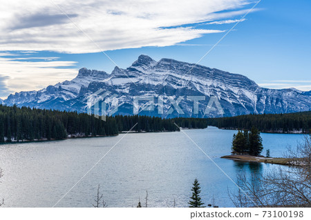 Two Jack Lake in early winter sunny day. Banff National Park, Canadian Rockies, Alberta, Canada. 73100198