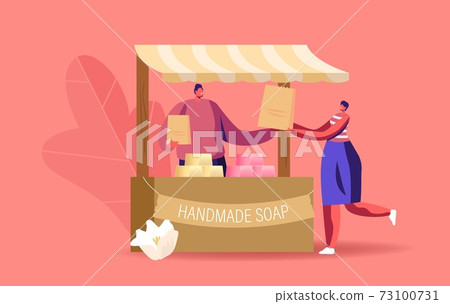 Seller Male Character Stand at Wooden Stall Presenting Handmade Soap on Craft Market. Organic Natural Production 73100731