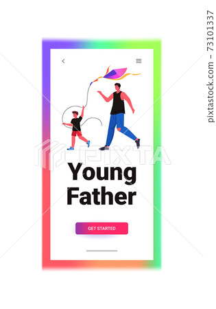 young father and son launching kite together parenting fatherhood concept dad spending time with kid 73101337