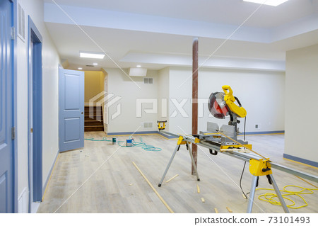 Circular saw cutting for new home construction interior finish details 73101493