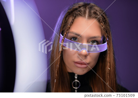 Cyberpunk and gadgets of the future. Futuristic fashion. 73101509