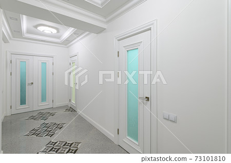 interior of white corridor with doors interior of white corridor with doors 73101810
