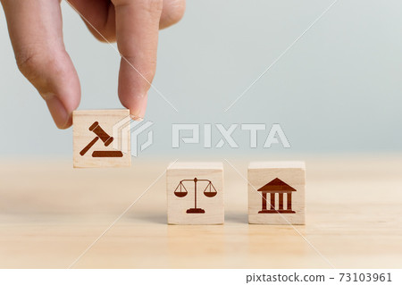 Wooden block cube shape with icon law legal justice Wooden block cube shape with icon law legal justice 73103961