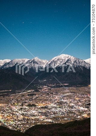 Night view of Omachi City and the Northern Alps from Mt. Takagari (early winter) Night view of Omachi City and the Northern Alps from Mt. Takagari (early winter) 73104870