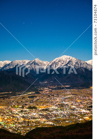 Night view of Omachi City and the Northern Alps from Mt. Takagari (early winter) Night view of Omachi City and the Northern Alps from Mt. Takagari (early winter) 73104874