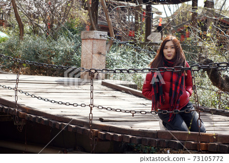 Girl on the bridge, she scream in the old town Lijiang Girl on the bridge, she scream in the old town Lijiang 73105772