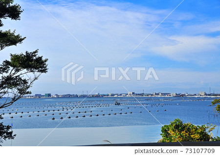 Aquaculture buoy floating in Mangokuura Cityscape of Watanoha, Ishinomaki City 73107709