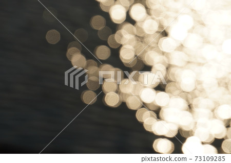 Sparkling surface of the river 73109285