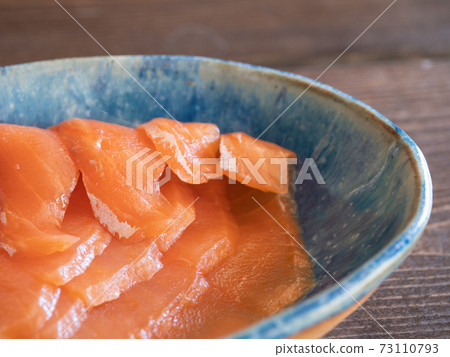 Close-up of fresh smoked salmon. 73110793
