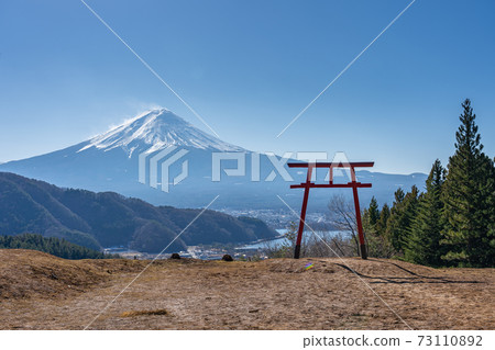 Mount Fuji with Torii gate of Asama Shrine in Kawaguchiko, Japan Mount Fuji with Torii gate of Asama Shrine in Kawaguchiko, Japan 73110892