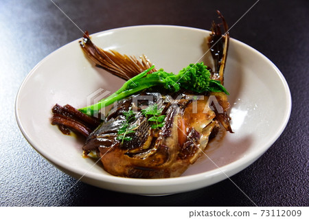 Boiled sea bream with rape blossoms, taken from an angle 73112009