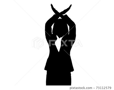 Silhouette of a female businessman giving a cross sign 73112579