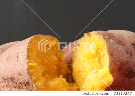 Anno potato from Tanegashima with a golden cross section Anno potato from Tanegashima with a golden cross section 73113247