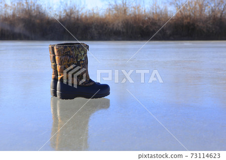 image of boots frozen lake 73114623