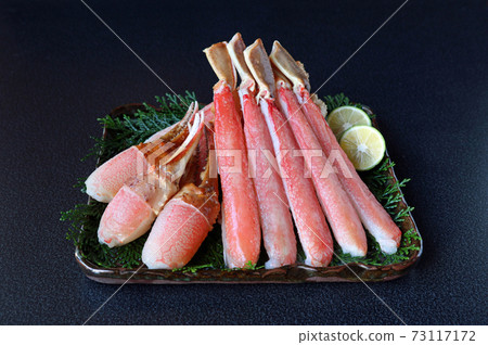 Nail meat and foot stick meat on a square plate with a dark blue background 73117172