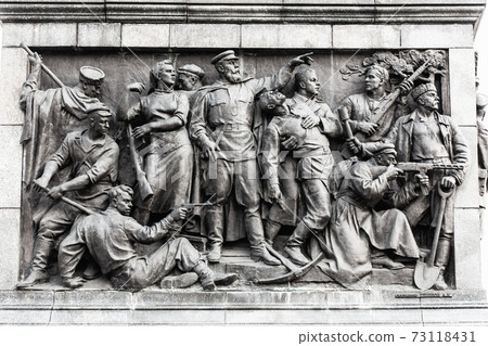 Minsk, Belarus. Bas-relief Scenes On Wall Of Stele Dedicated To Memory Of The Great Patriotic War. Victory Square Minsk, Belarus. Bas-relief Scenes On Wall Of Stele Dedicated To Memory Of The Great Patriotic War. Victory Square 73118431