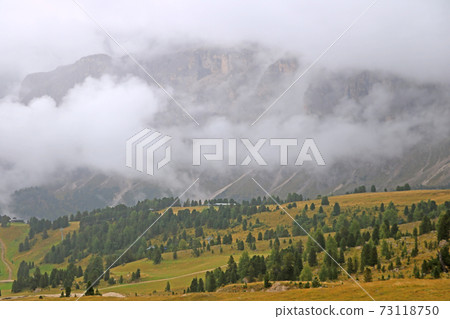 Dolomitic massif in the Italian Dolomites with cloudy sky. Italy. Dolomitic massif in the Italian Dolomites with cloudy sky. Italy. 73118750