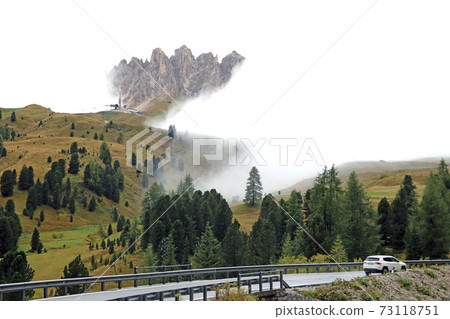 Dolomites - mountain landscape. Dolomites is a mountain in Tyrol, Italy. Dolomites - mountain landscape. Dolomites is a mountain in Tyrol, Italy. 73118751