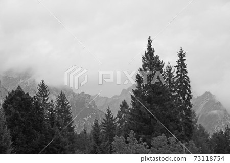 The Dolomites are a mountain range located in northeastern Italy. They form a part of the Southern Limestone Alps. 73118754
