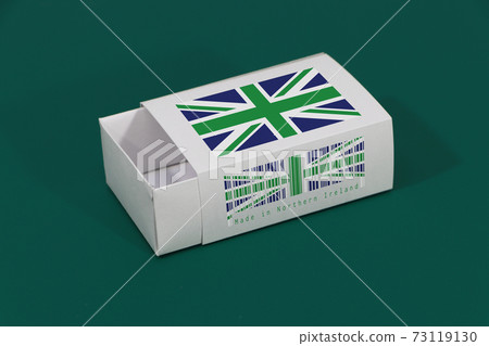 Northern Ireland flag on white box with barcode and the color of nation flag on green background Northern Ireland flag on white box with barcode and the color of nation flag on green background 73119130