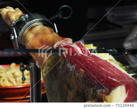 Jamon. Jamon serrano. Traditional Spanish ham on black close up. Slicing Hamon iberico 73120448