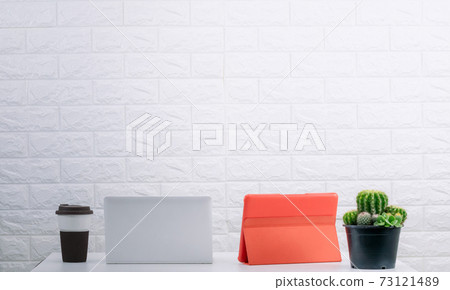 Office desk, tablet computer and coffee mug Office desk, tablet computer and coffee mug 73121489