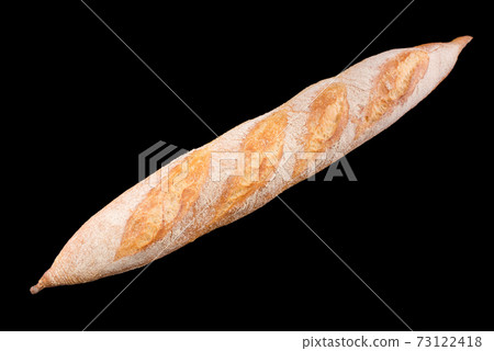 Freshly baked homemade bread isolated on black. French bread baguette. Healthy eating and traditional bakery, baking bread concept 73122418