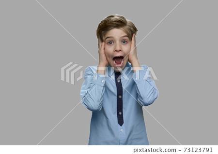 Portrait of frightened child boy. Portrait of frightened child boy. 73123791