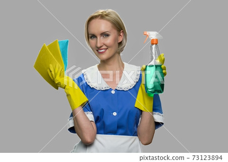 Young smiling cleaner woman. 73123894