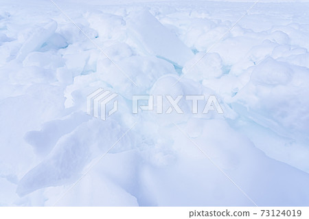 Beautiful natural winter background. Pure white mountain snow Beautiful natural winter background. Pure white mountain snow 73124019