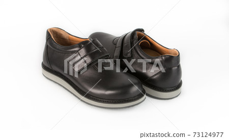children's black orthopedic shoes on a white background children's black orthopedic shoes on a white background 73124977