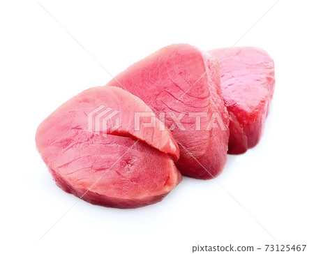 Steak of tuna fish on white backgrounds. 73125467