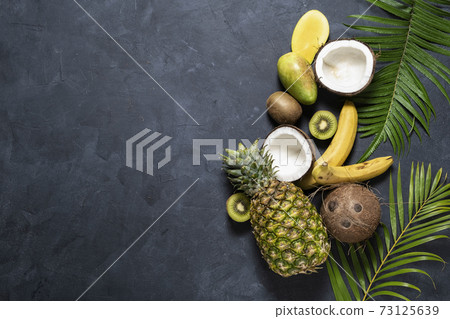Mix Tropical fruit on dark background, top view. Healthy eating , Nutrition and  diet concept 73125639