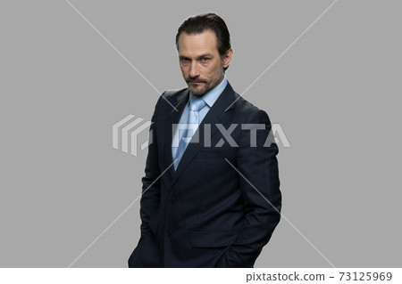 Portrait of mature businessman with angry face. Portrait of mature businessman with angry face. 73125969