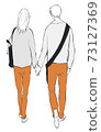 Back view of a couple walking hand in hand 73127369