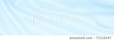 Smooth elegant blue silk or satin luxury cloth texture as abstract background. Luxurious background design Smooth elegant blue silk or satin luxury cloth texture as abstract background. Luxurious background design 73128347