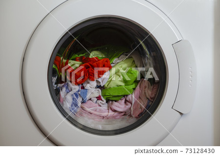 Washing machine door with rotating garments inside Washing machine door with rotating garments inside 73128430