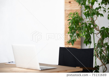 Office scenery with a laptop Office scenery with a laptop 73131689