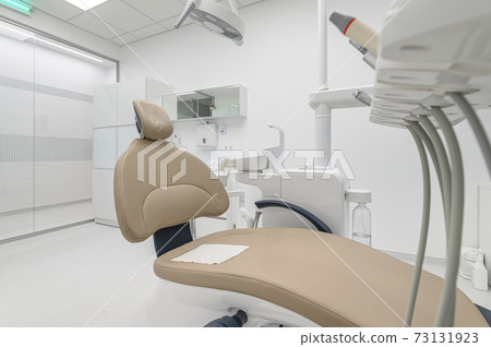 patient chair in Interior of dentistry medical office patient chair in Interior of dentistry medical office 73131923