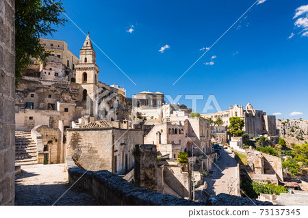 Cave dwelling in Matera, Italy and St. Peter's Church 73137345