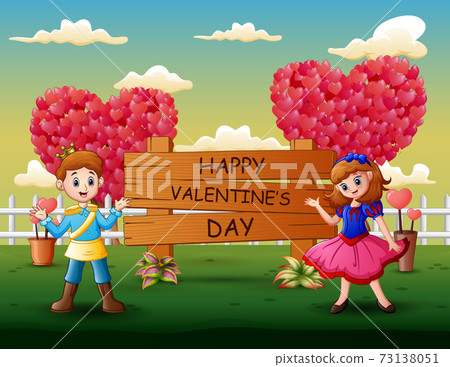 A couple of prince and princess presenting Happy Valentines Day 73138051